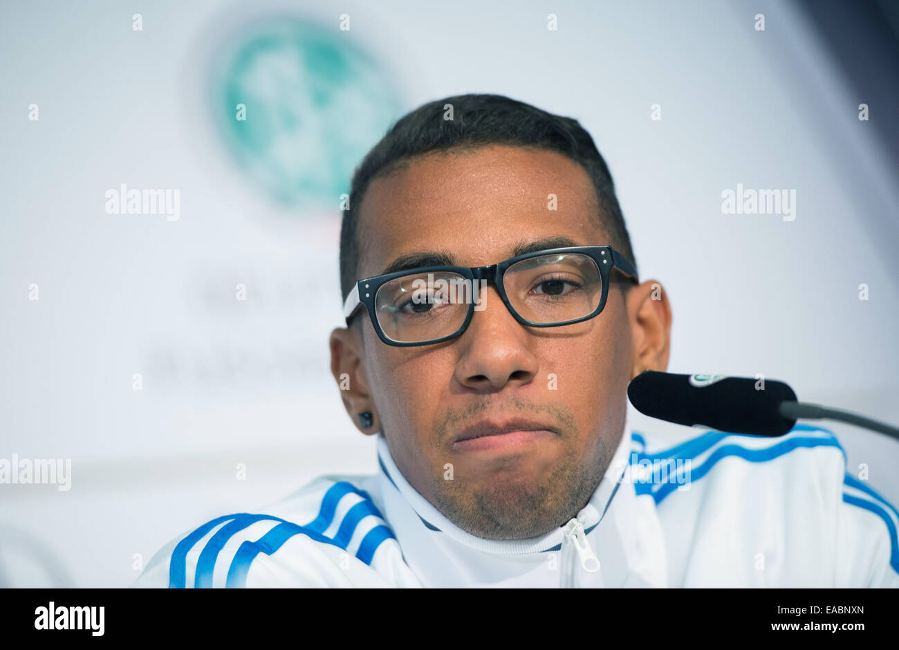 Berlin, Germany. 11th Nov, 2014. Germany's Jerome Boateng speaks during a press conference about the EURO qualifier in Berlin, Germany, 11 November 2014. Credit:  dpa picture alliance/Alamy Live News Stock Photo