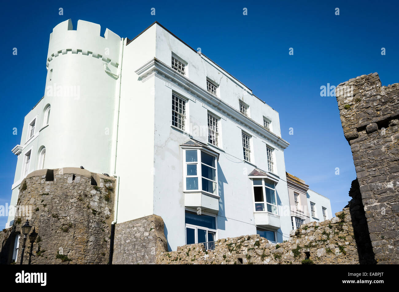 Tenby town walls and castellated Imperial Hotel Stock Photo