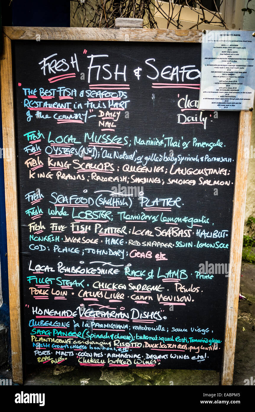 Chalk board menu outside the Plantagenet fish restaurant in Tenby UK Stock  Photo - Alamy