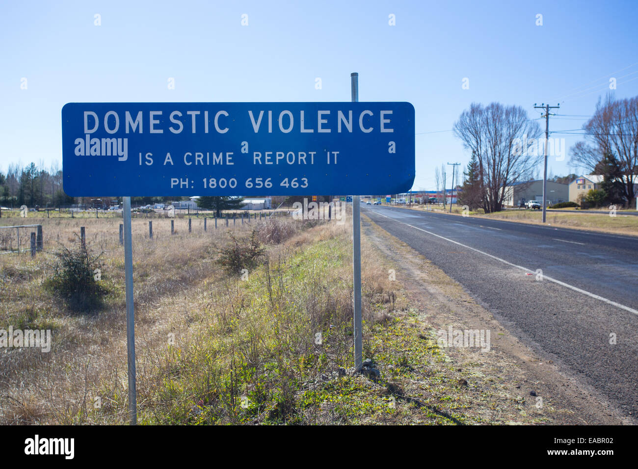 Road sign to report domestic violence, Australia Stock Photo