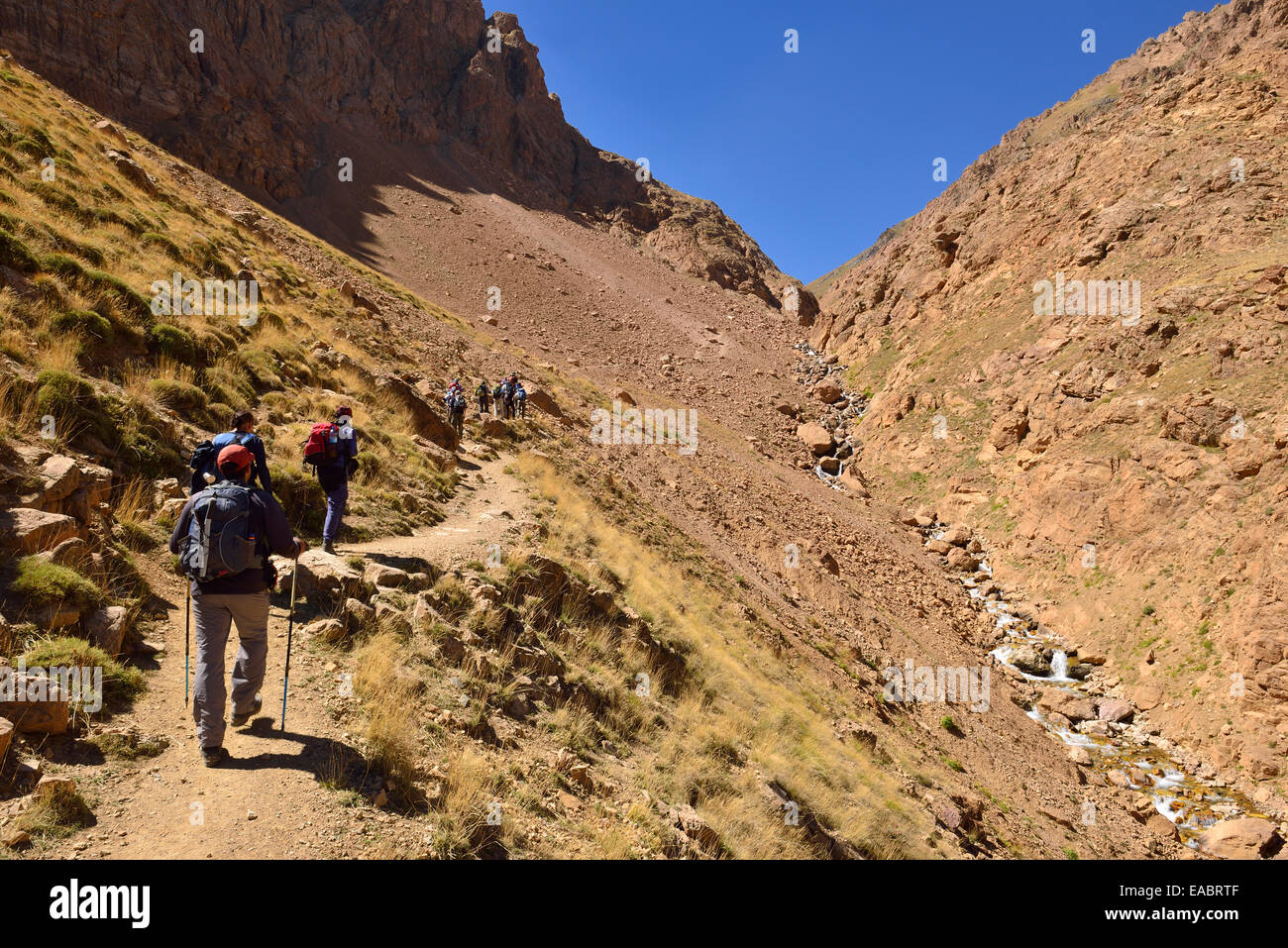 Iran Mazandaran Province Alborz Mountains Takht-e Suleyman Massif Alam Kuh area group of people hiking in Khoram Dasht valley Stock Photo