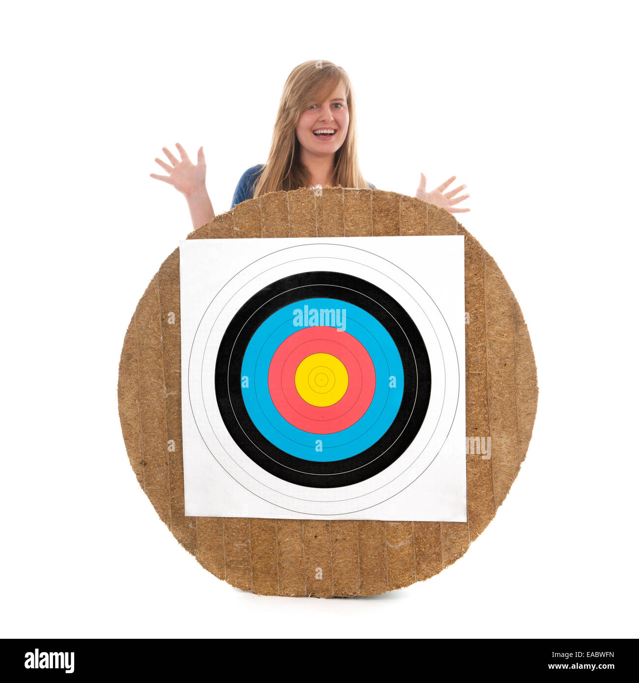 Teen girl behind archery target isolated over white background Stock ...