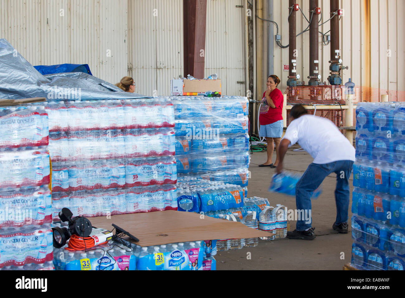 A water charity in Porterville supplying bottled water to houses who have had no running water for over five months, near Bakers Stock Photo