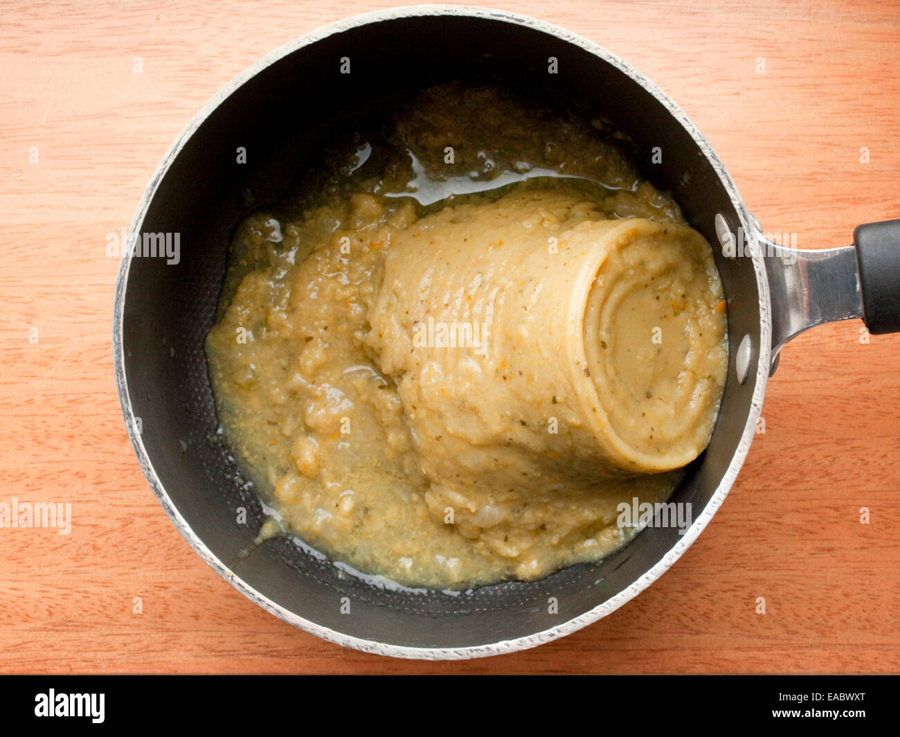 pea soup from can in pot Stock Photo