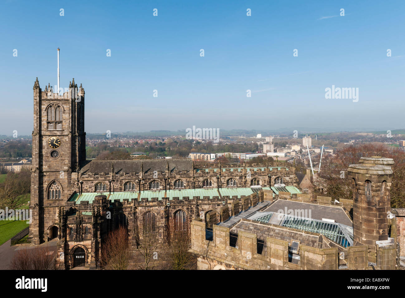 HMP Lancaster Castle, Lancashire, UK. View from the battlements over Lancaster Priory church Stock Photo