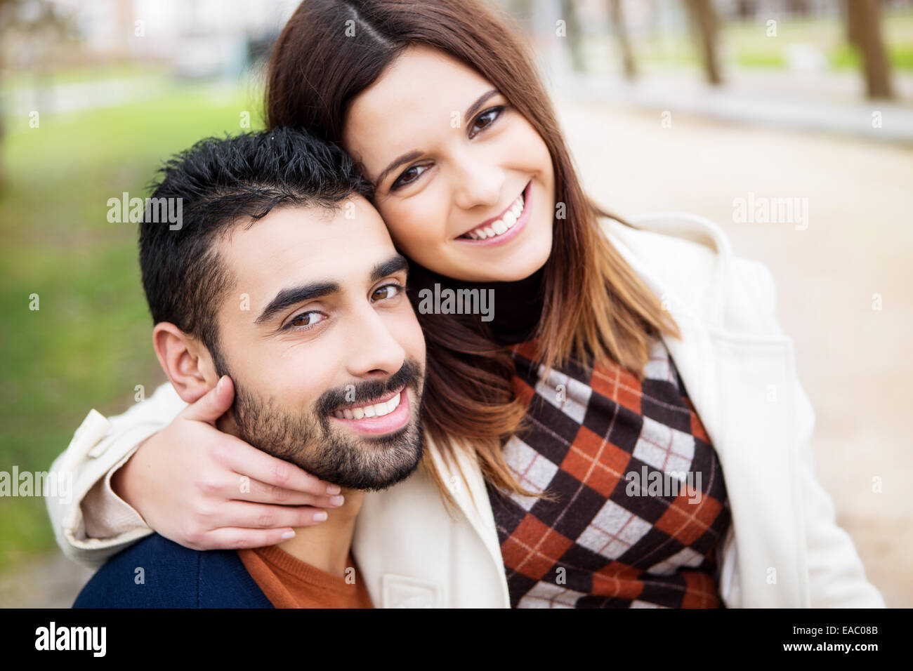 Stylish Indian Hindu Couple Posed On Street And Looking At Mobile Phone And  Makes Selfie Together. Stock Photo, Picture and Royalty Free Image. Image  111305058.