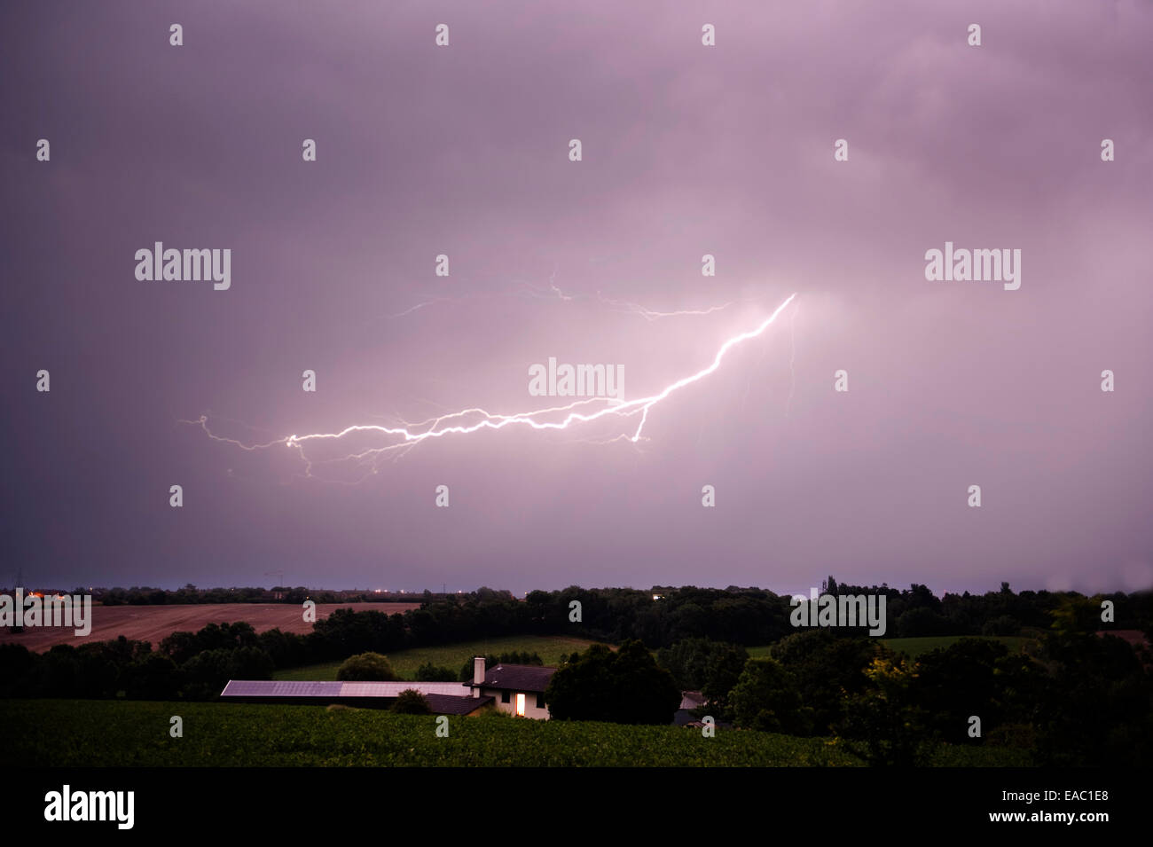 Lightening Strikes over farmland UK Stock Photo