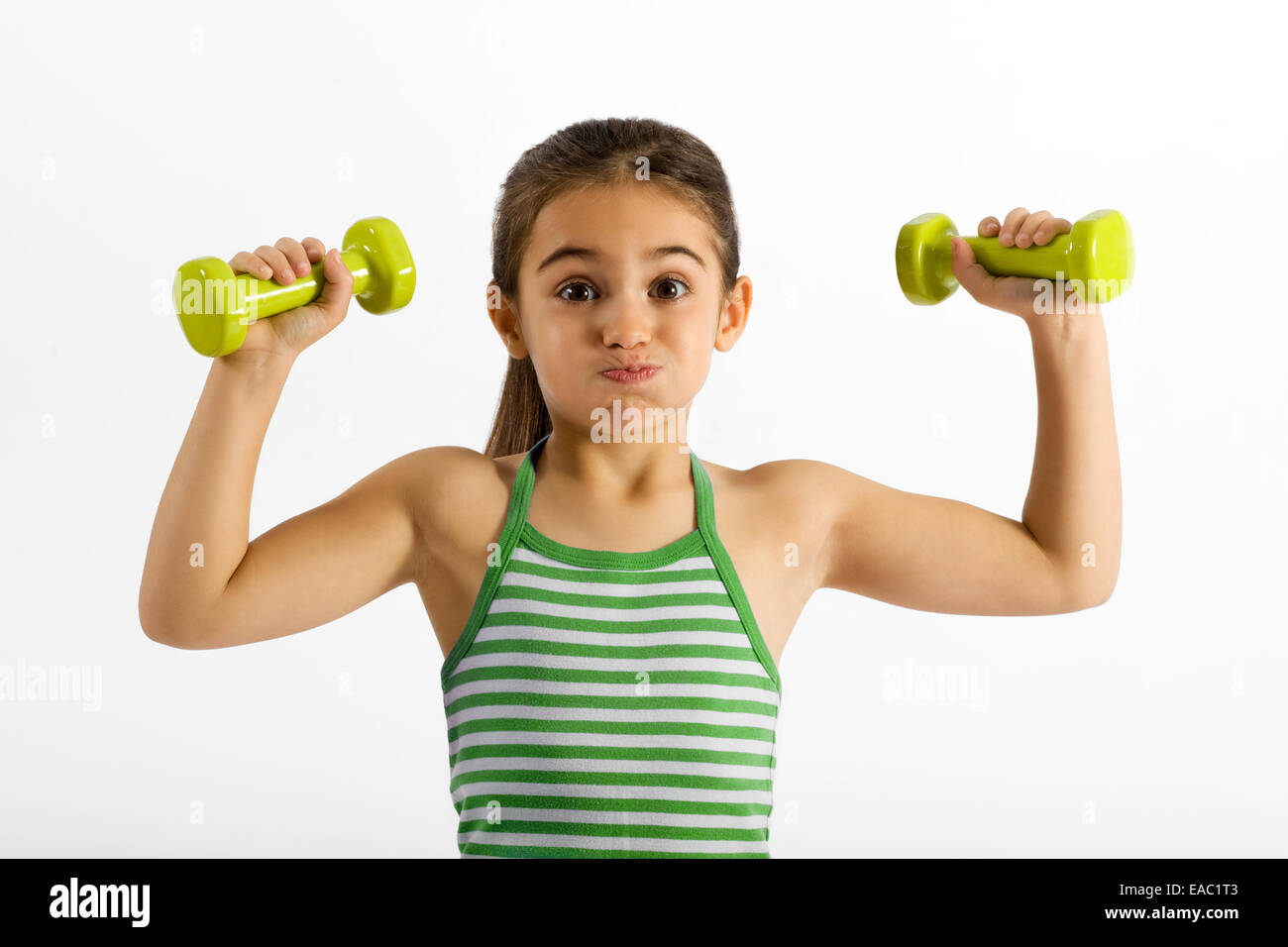 Cute little girl working out Stock Photo
