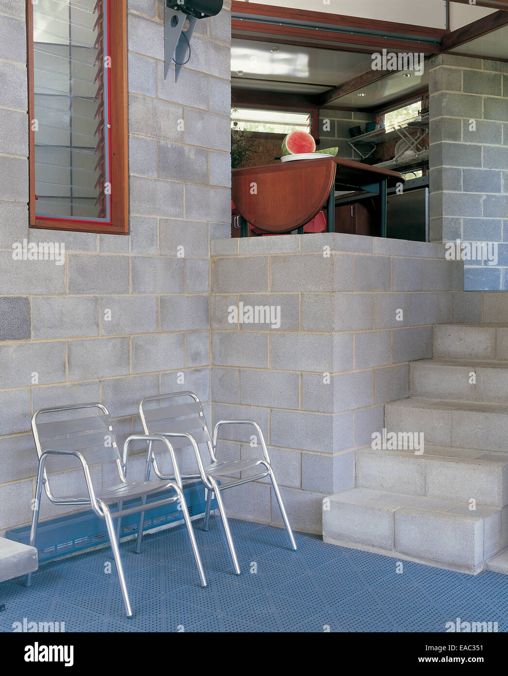 kitchen and living room interior of home made with cinder blocks Stock Photo