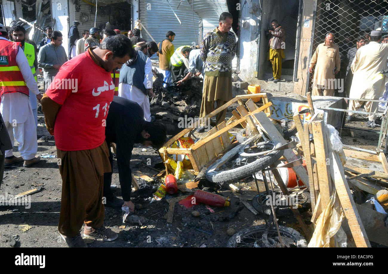 View of venue after a bomb blast as the Anti-terrorism court judge Nazeer Lango was the target of the attack. The judge survived the explosion while his car was damaged in the attack, at Double-Road of Quetta on Tuesday, November 11, 2014. Two people were killed and 27 others injured in explosion which ripped through the locality, completely damaging several cars and shops in the area. Around 25 kilograms of explosives were planted in a Suzuki Alto which was parked near the shops. Credit:  Asianet-Pakistan/Alamy Live News Stock Photo