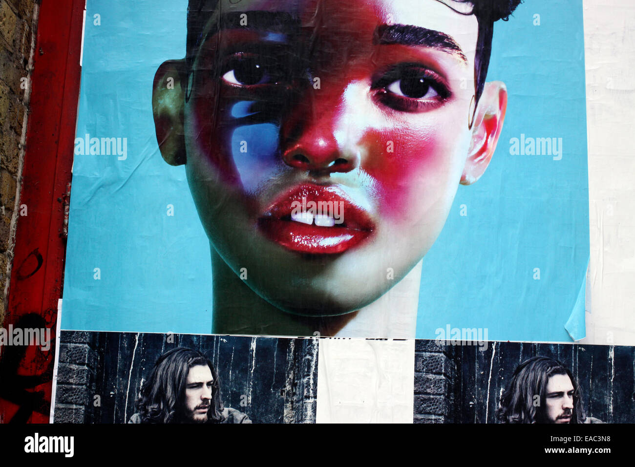 Fly posters on a wall in Shoreditch, London Stock Photo - Alamy