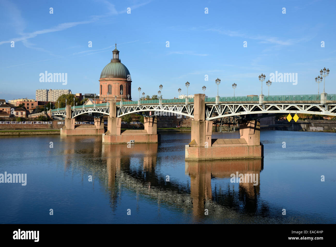 St Pierre Bridge or Pont Saint Pierre & Dome of St Joseph's Chapel & the Garonne River Toulouse France Stock Photo