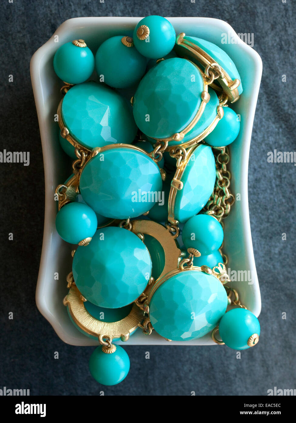 Turquoise Jewelry in dish Stock Photo