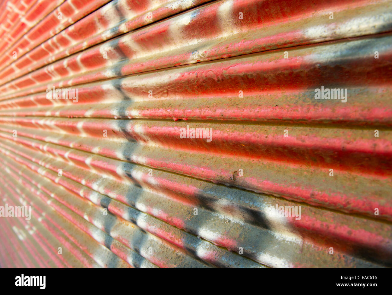 Close up of a shutter covered in graffiti at the Baltimore Streetcar Museum on Falls Road in Baltimore, Maryland USA Stock Photo