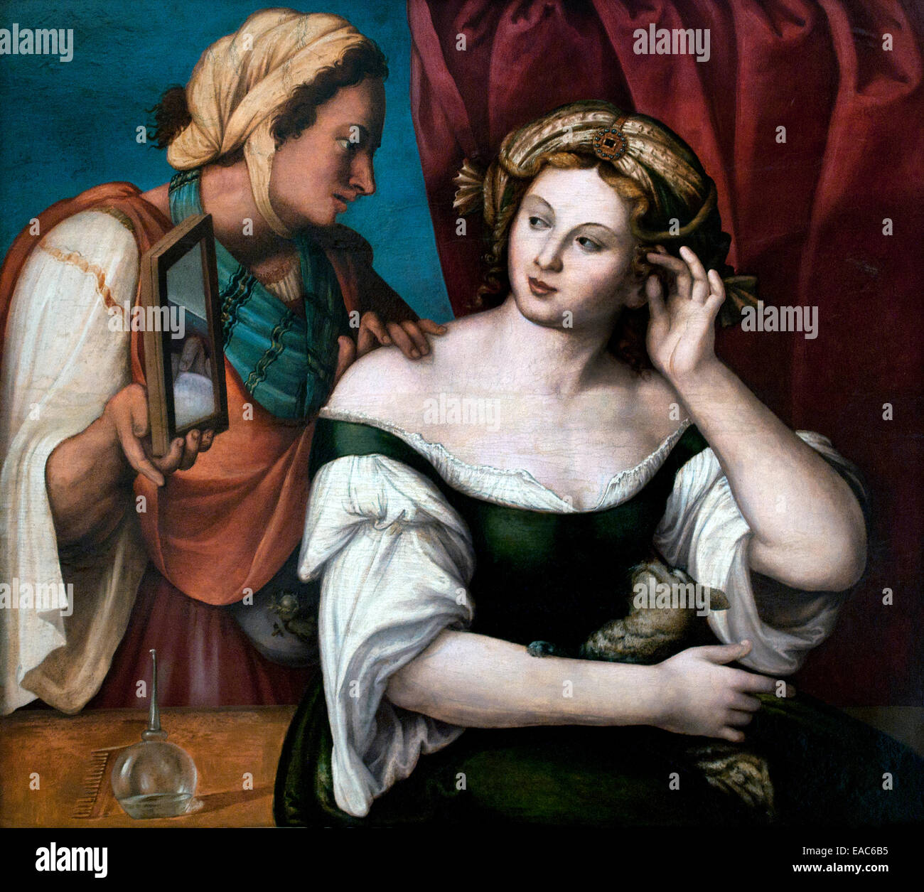 Young woman at her toilet with her servant Girolamo Marchesi - Girolamo da Cotignola 1471 – 1550 Renaissance Italy Italian Stock Photo