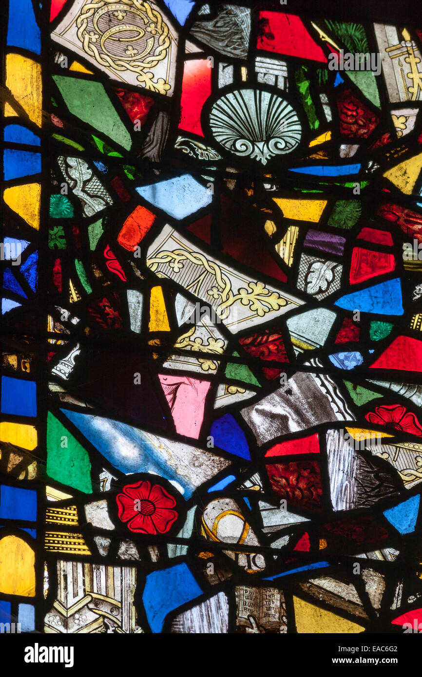 A stained glass window made up from medieval fragments Stock Photo