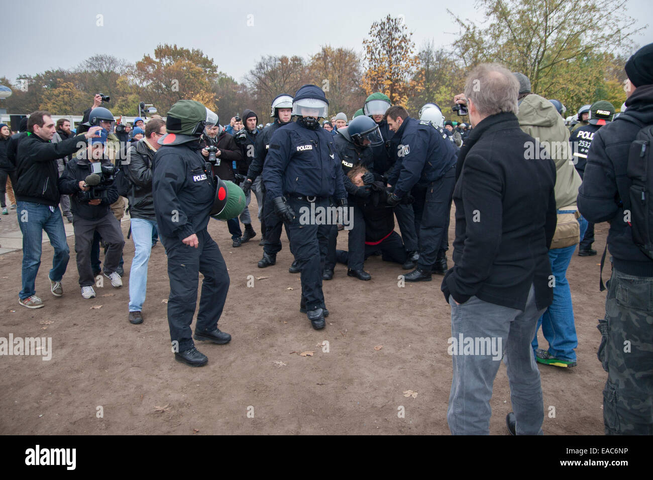 Demonstration by German Reichsbürger movement at Reichstag in Berlin, Germany. Police arrests a counter protester. Stock Photo