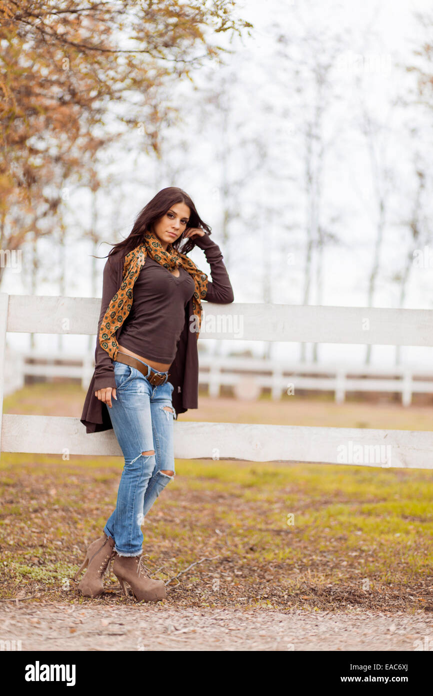 Young woman at autumn park Stock Photo - Alamy