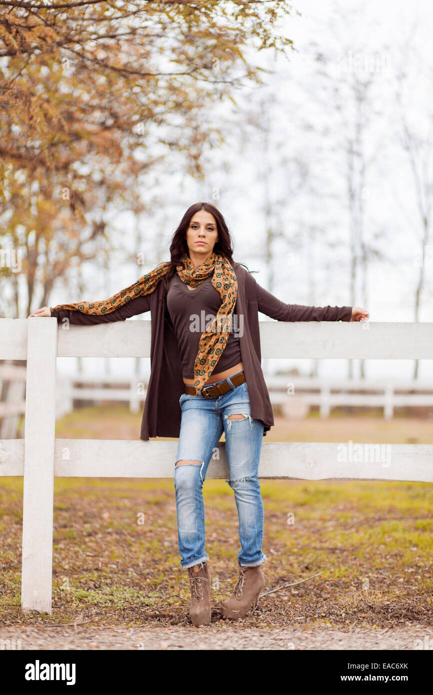 Young woman at autumn park Stock Photo - Alamy