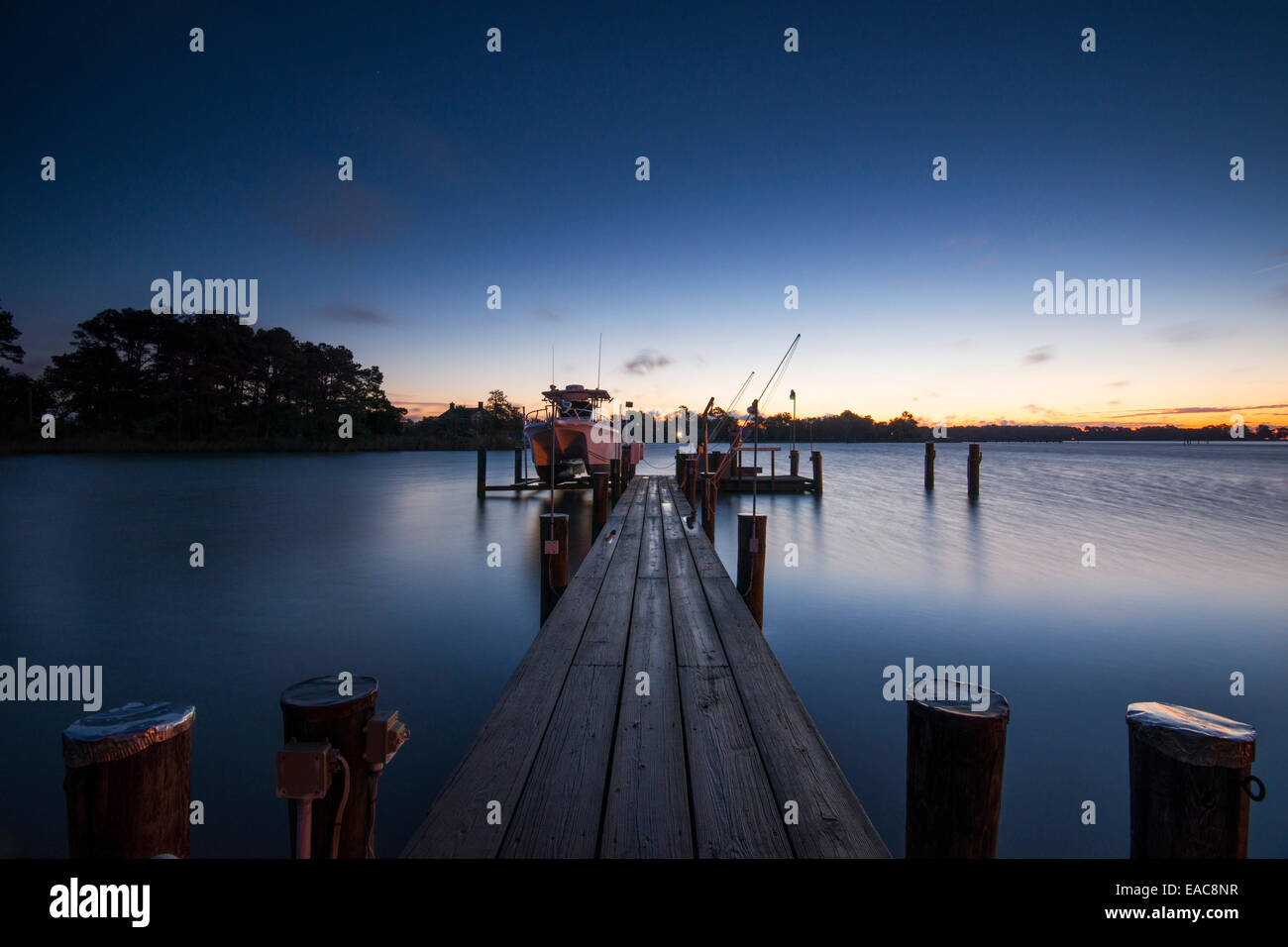 Sunrise blue hour by the dock of property on Tilghman Island, Talbot County Maryland USA Stock Photo