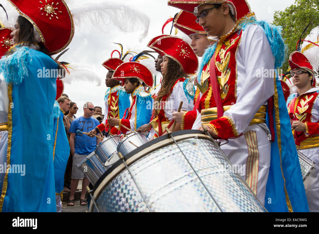 Marching drummers at the Carnaval Del Pueblo in South London England. The Carnival De Pueblo is an Latin American festival. Stock Photo