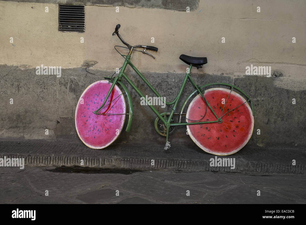 A bike with wheels like a sliced water melon Stock Photo