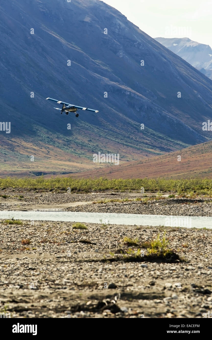 Bushplane arriving at the Noatak River, Brooks Range, Arctic Alaska