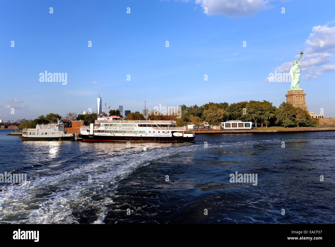 Leaving Liberty Island on ferry New York harbor Stock Photo