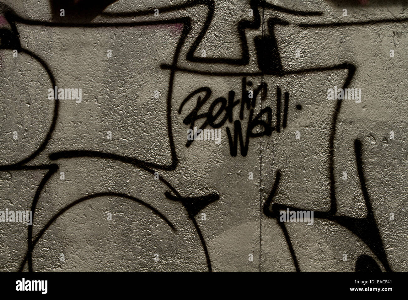 Graffiti street art Berlin wall tags letters Stock Photo