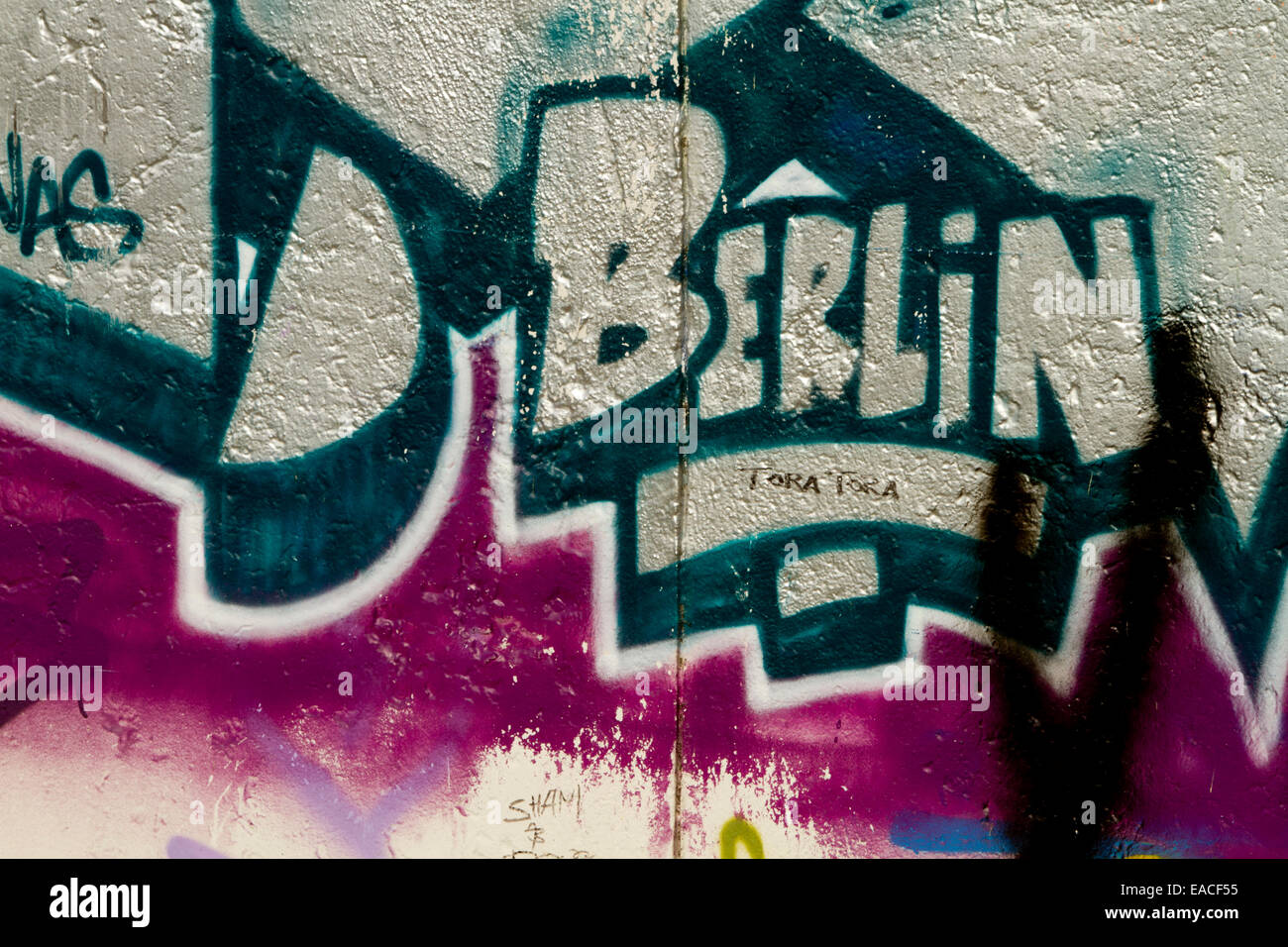 Graffiti street art Berlin wall tags letters Stock Photo