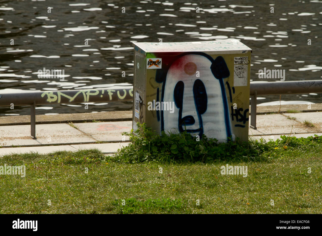 Graffiti panda electric box river Berlin Germany Stock Photo