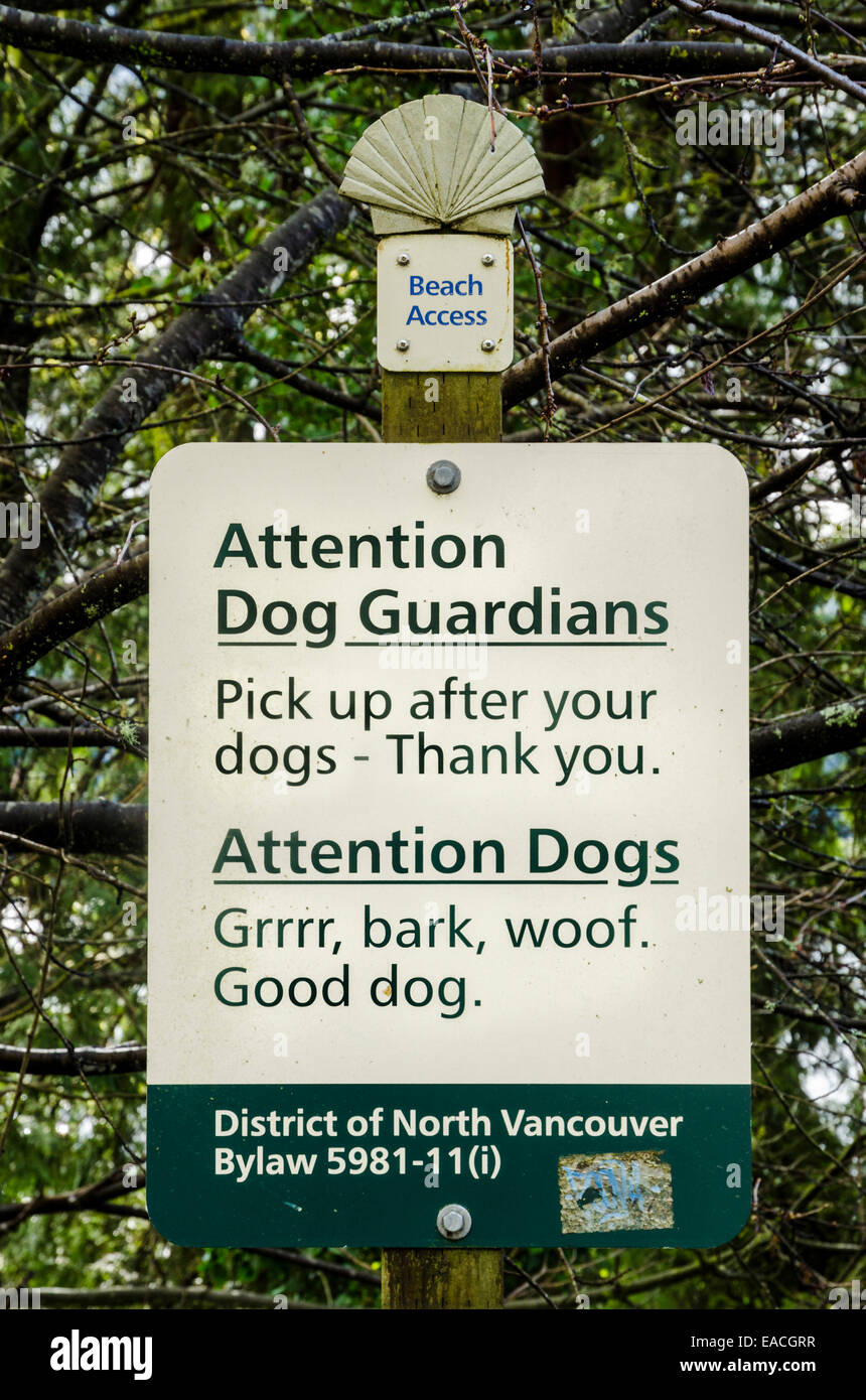 Quirky 'Pick up after your dogs' sign. Deep Cove, District of N. Vancouver, British Columbia, Canada Stock Photo