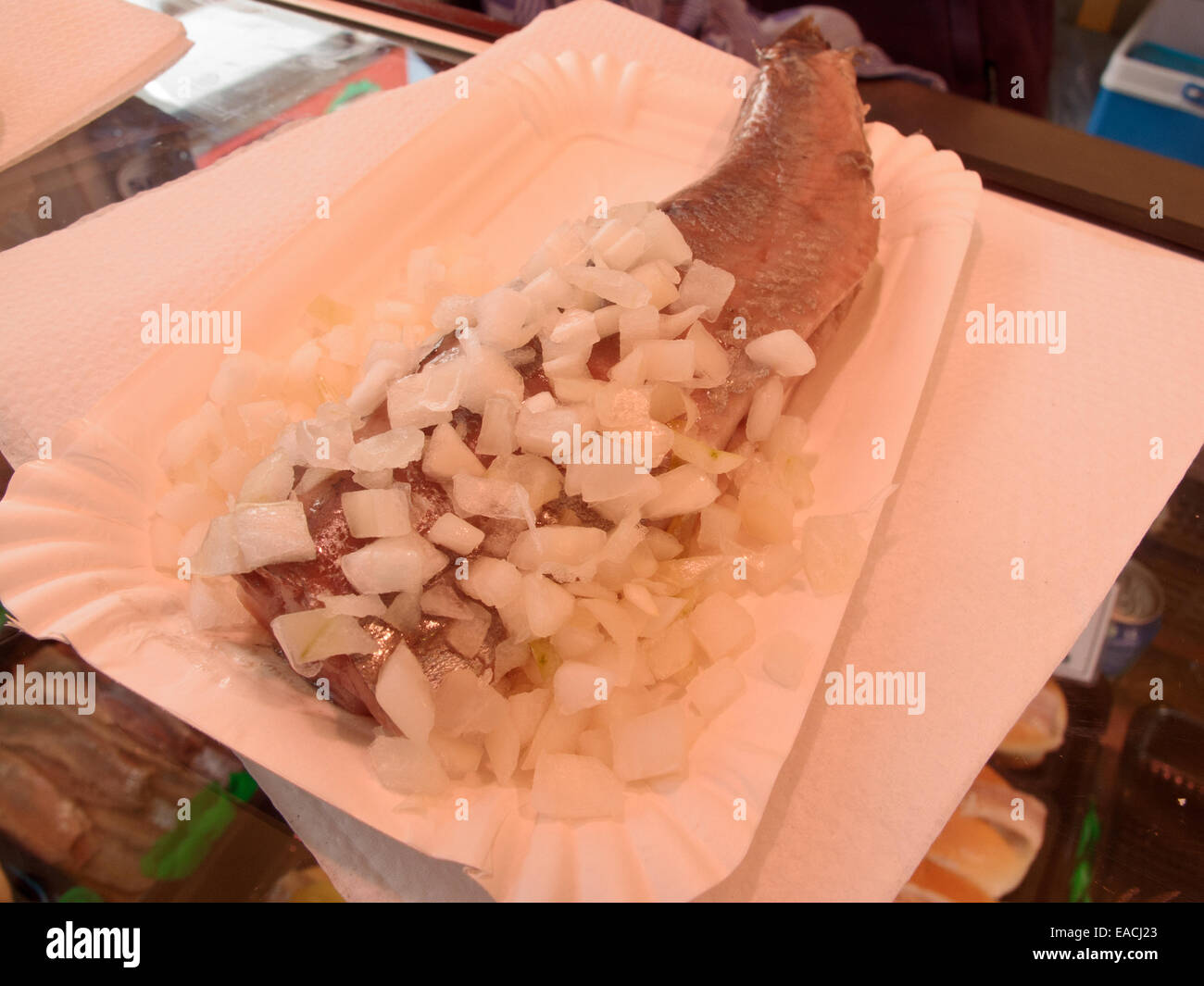 Raw herring with onions, typical Dutch delicacy Stock Photo Alamy