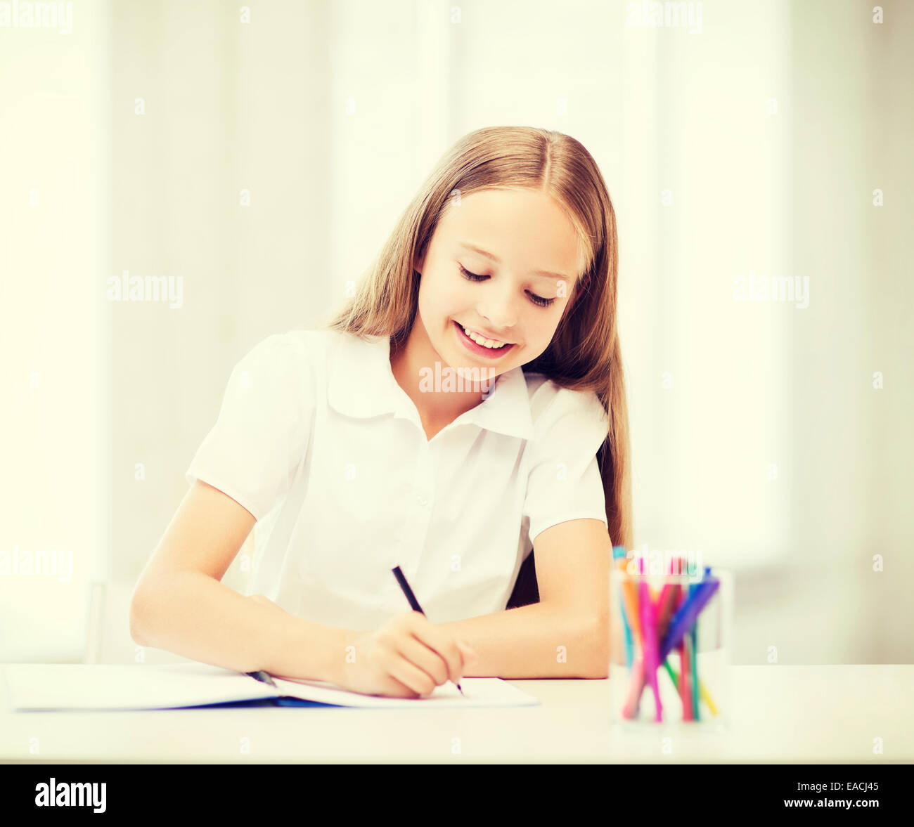 little student girl drawing at school Stock Photo - Alamy