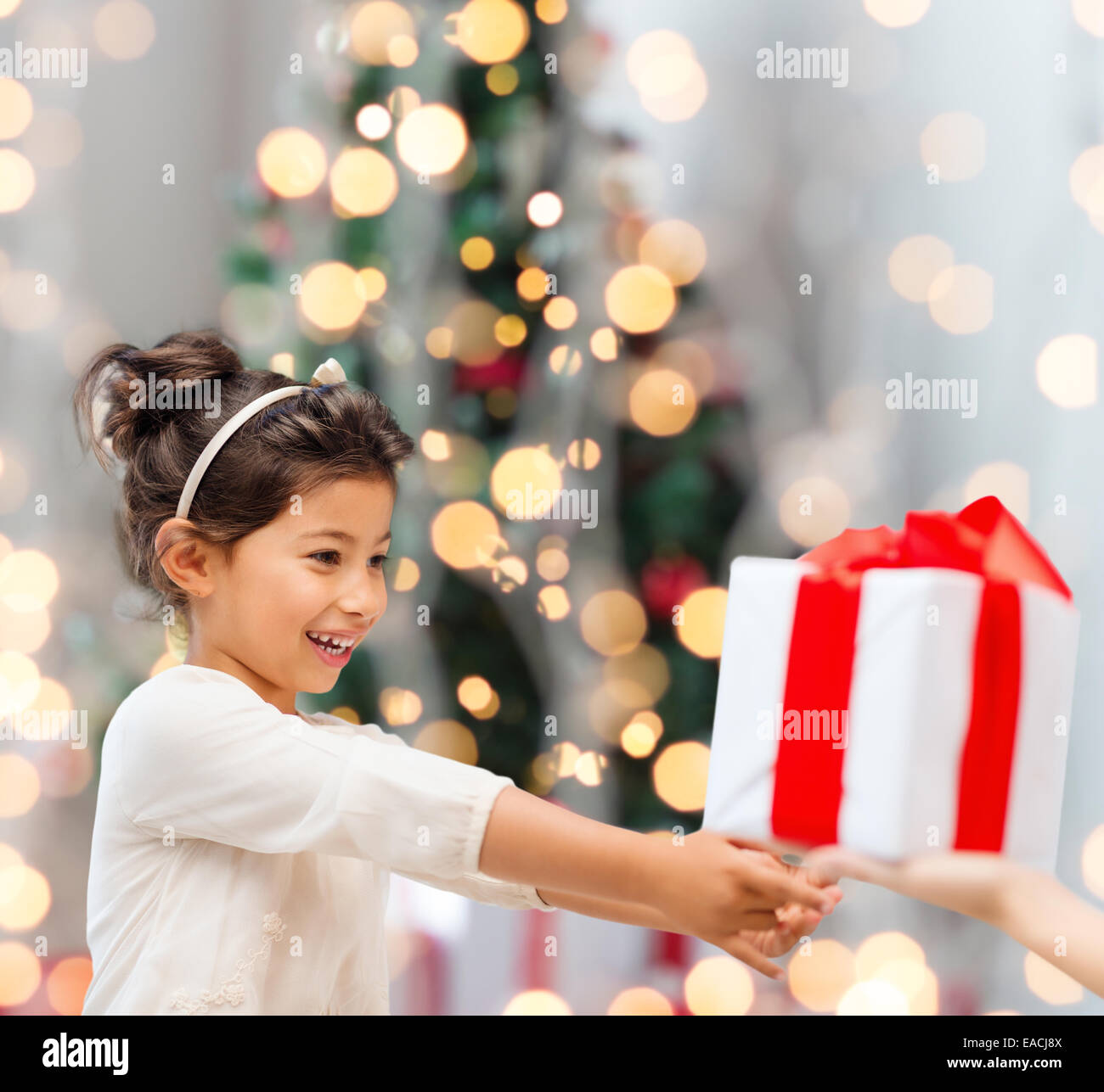 smiling little girl with gift box Stock Photo - Alamy