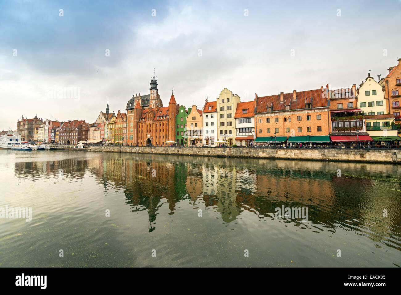 The classic view of Gdansk with the Hanseatic-style buildings reflected in the River Motlawa. Stock Photo