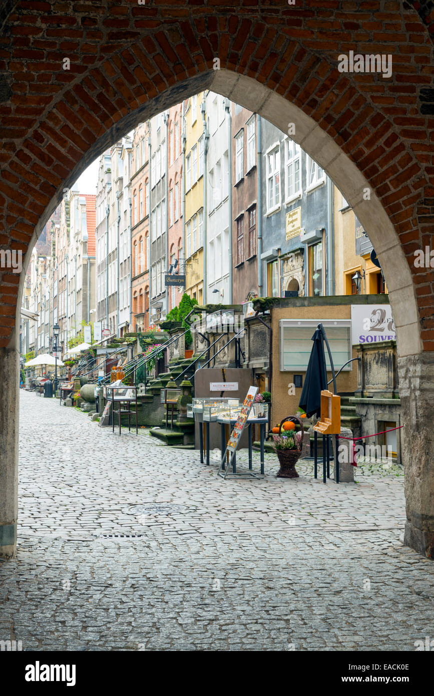 A view through the gate into the street Mariacka in Gdansk, Poland. Stock Photo
