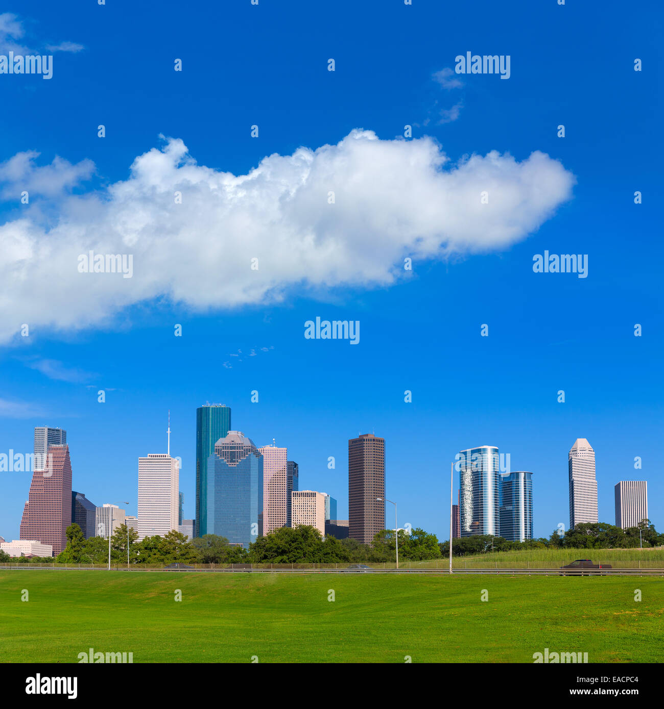 Houston skyline blue sky and Memorial park turf at Texas USA US Stock