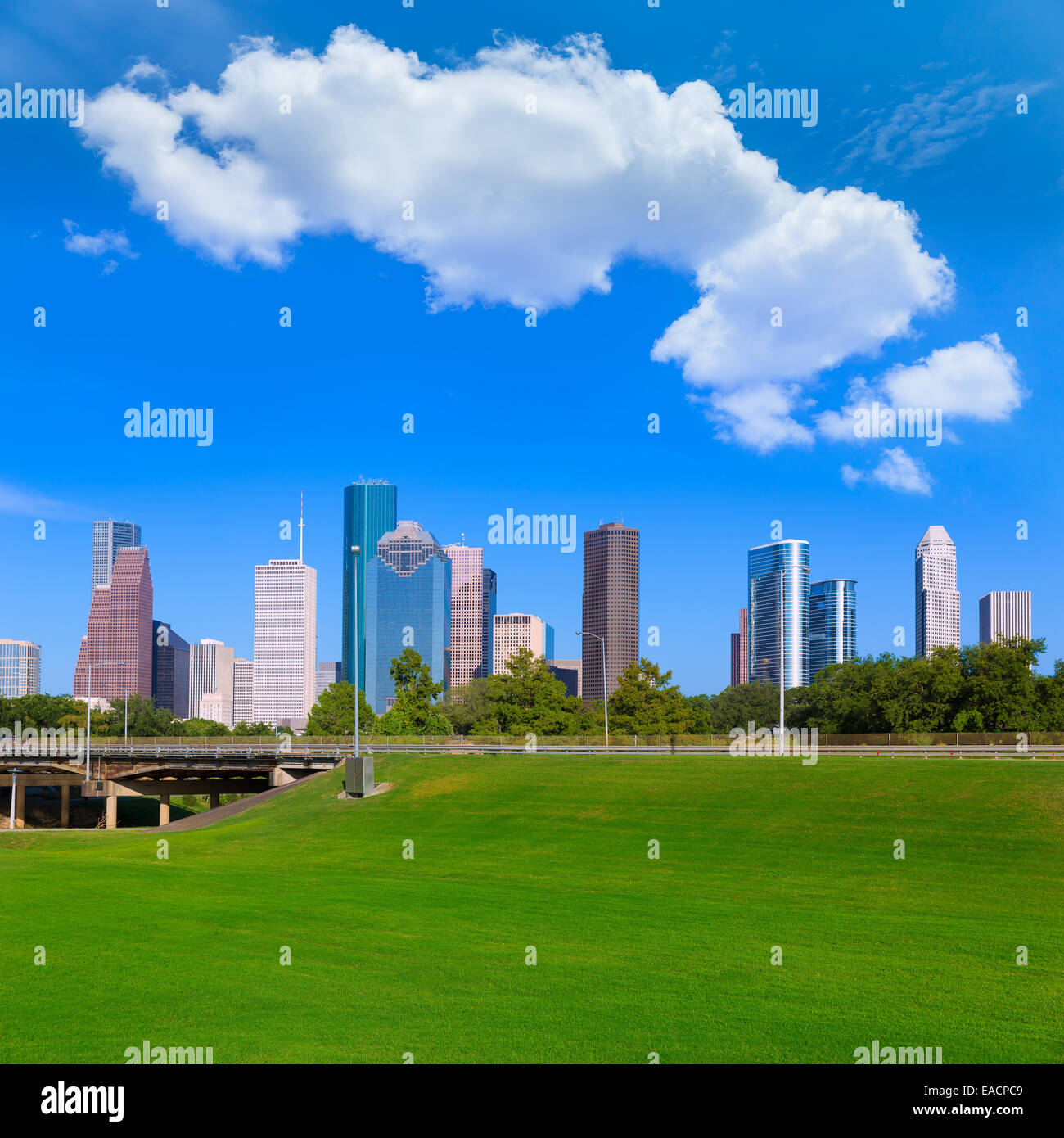 Houston skyline blue sky and Memorial park turf at Texas USA US Stock
