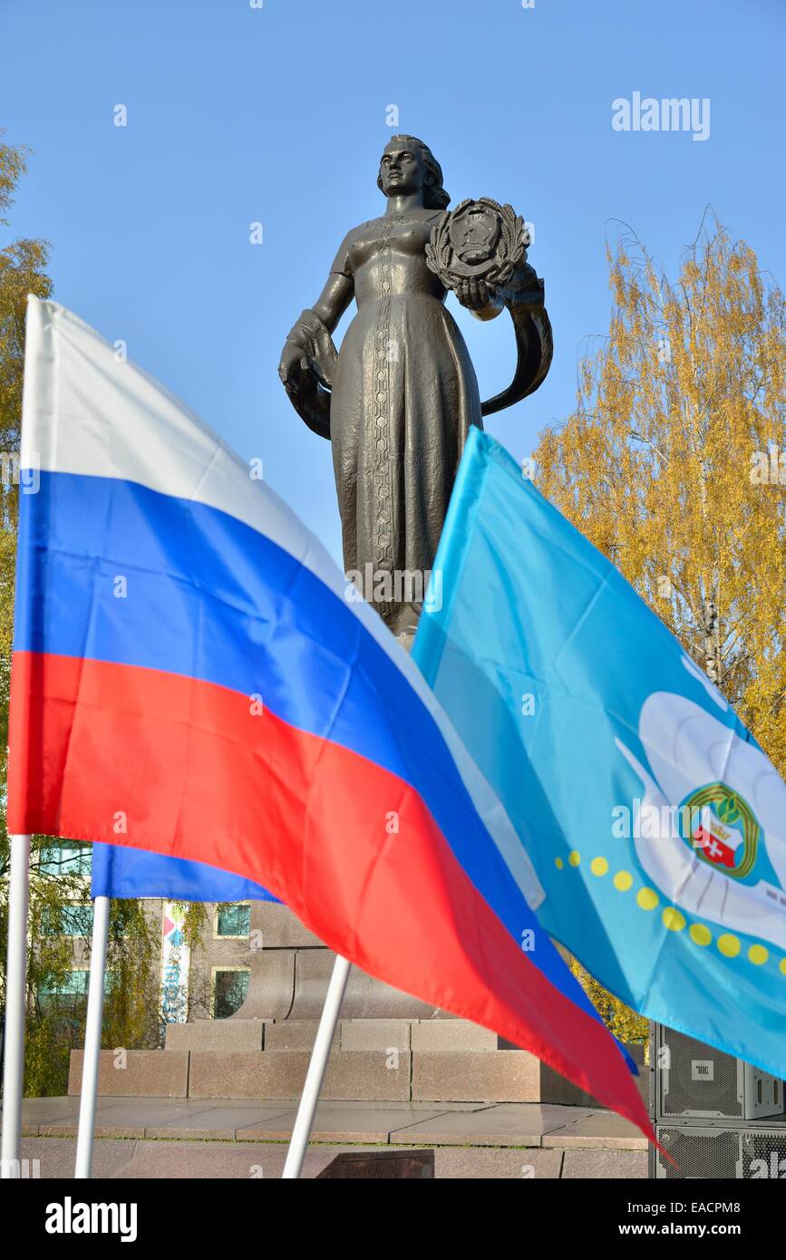 Flags of the Russian Federation and Kaliningrad on the background of the monument Mother Russia Stock Photo