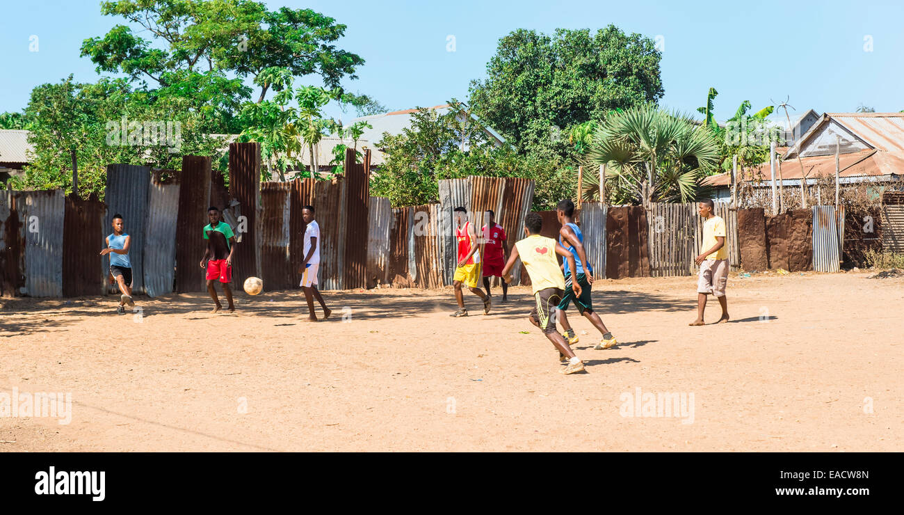 Malagasy men playing football, Belo sur Tsiribihina, Morondava, Toliara province, Madagascar Stock Photo