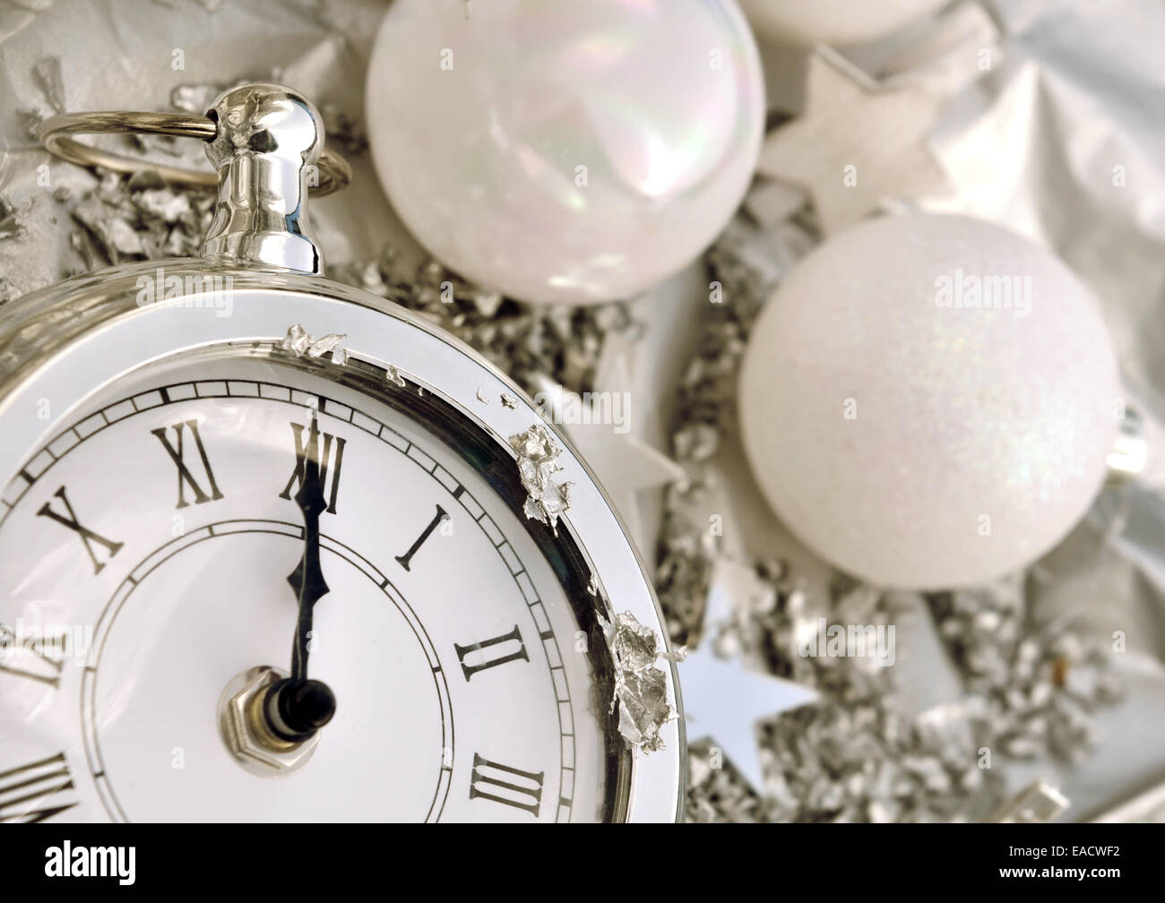 clock striking midnight silver holiday decor Stock Photo