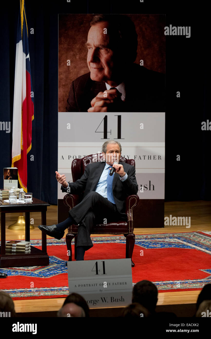 College Station, Texas, USA. 11th November, 2014. Former U.S. President George W. Bush talks about his new book, '41 A Portrait of My Father'  during a book event at the Bush Library at Texas A&M University.  Bush's dad, former President George H.W. Bush and wife Barbara were in the audience. Credit:  Bob Daemmrich/Alamy Live News Stock Photo