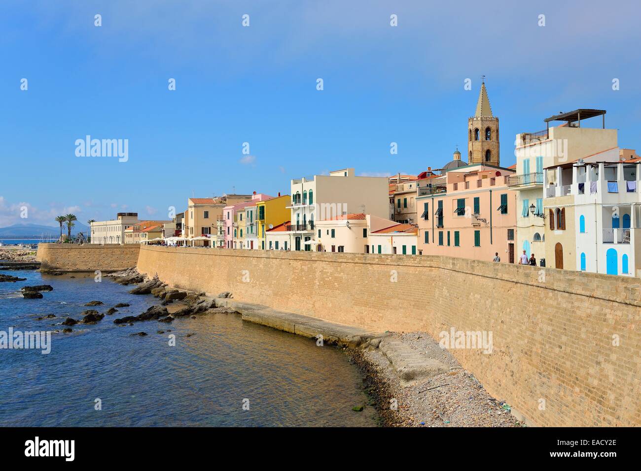 Row of houses on the old ramparts by the sea, Alghero, Province of Sassari, Sardinia, Italy Stock Photo