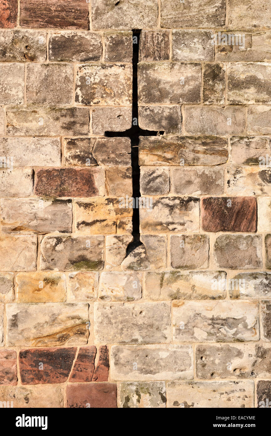 Lancaster Castle, Lancashire, UK. An arrow slit or loophole in the 15c gatehouse (John O'Gaunt's Tower) Stock Photo