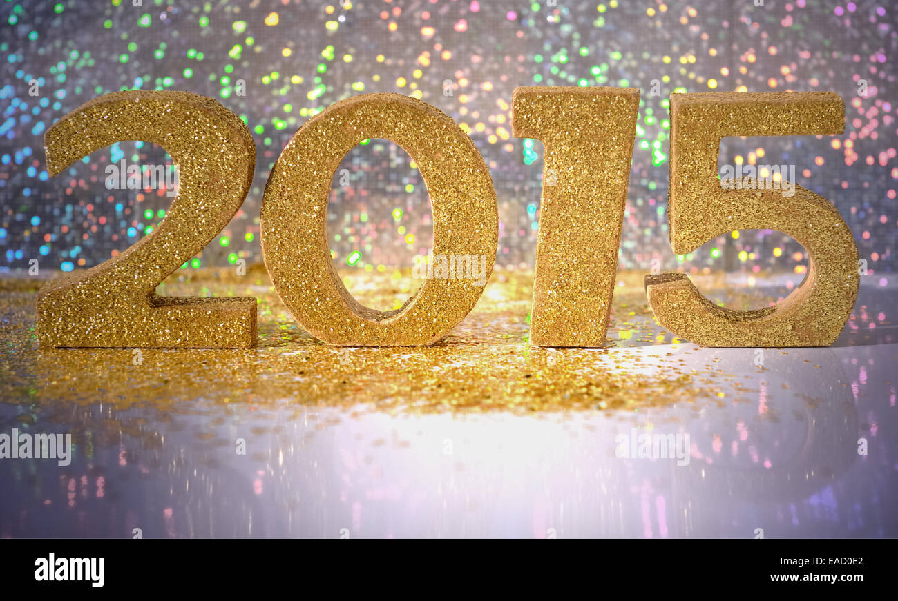 golden figures 2015 on a colorful bokeh background Stock Photo