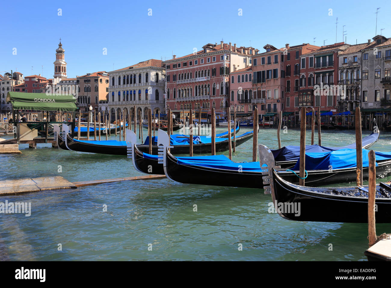 Gondolas berthed on the Grand Canal in Venice, Italy. Stock Photo