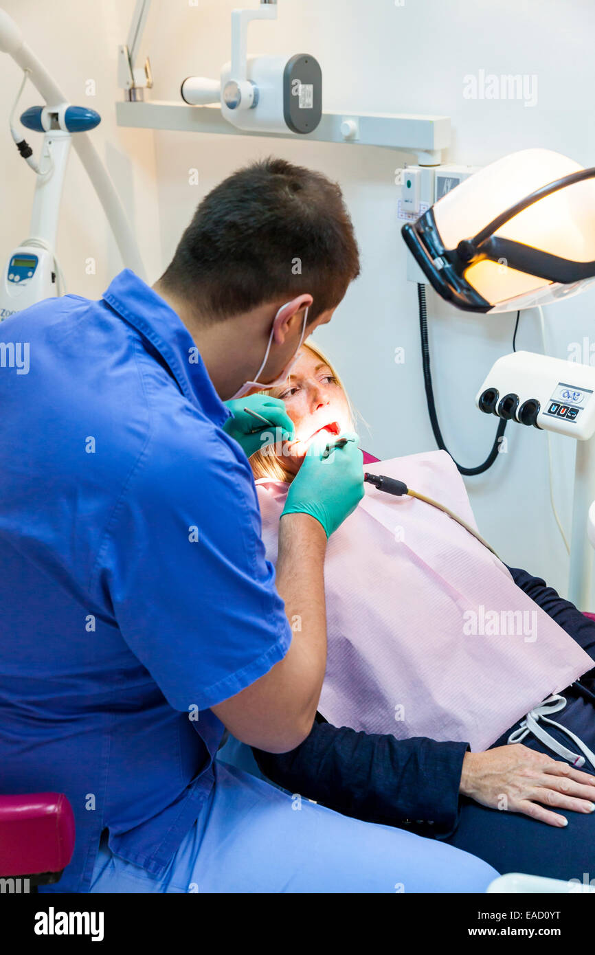 A customer is treated professionally in a dentist's surgery for inexpensive treatment for dentures, New Belgrade, Belgrade Stock Photo