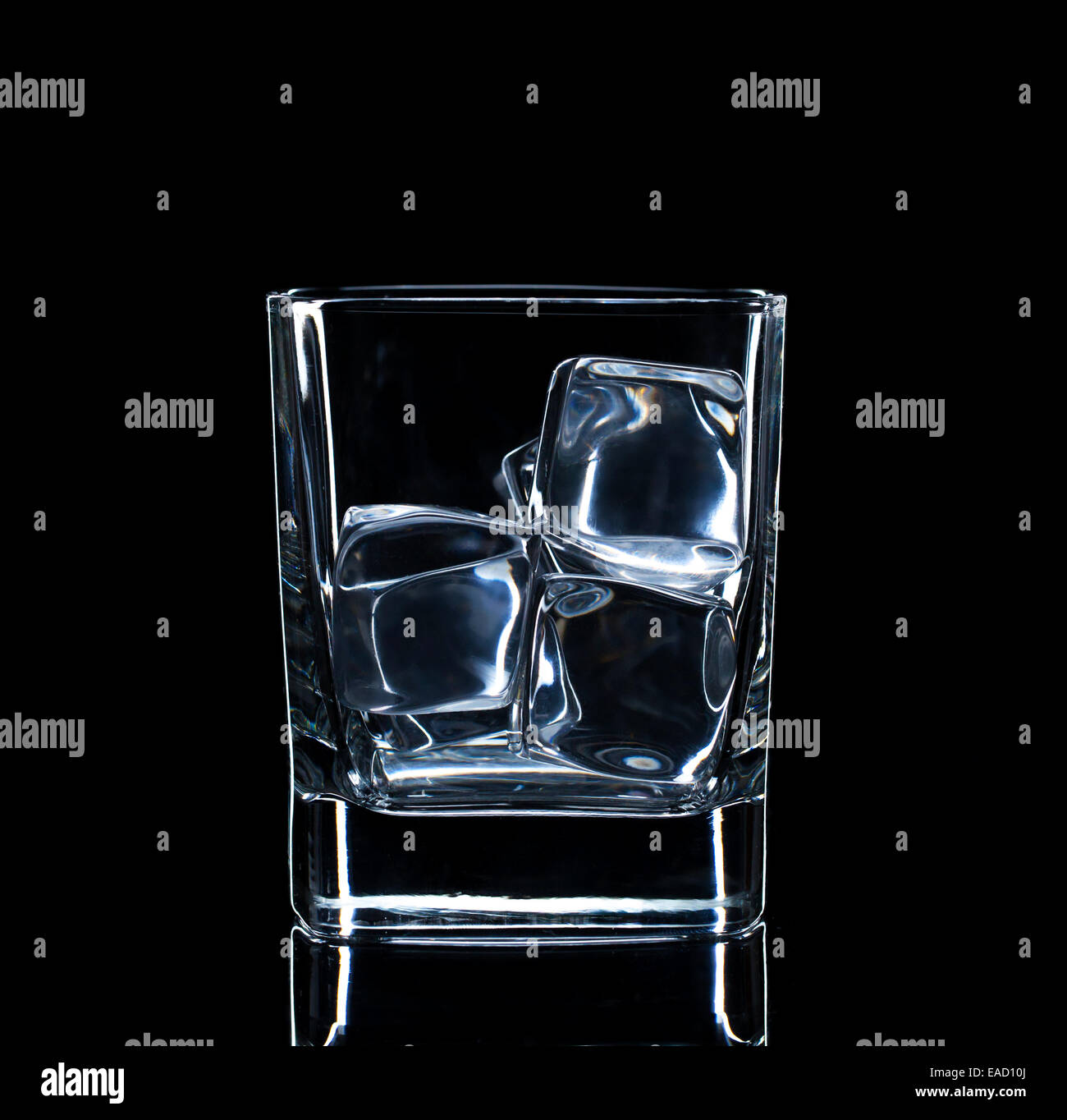Glass with ice cubes, isolated on black background Stock Photo - Alamy