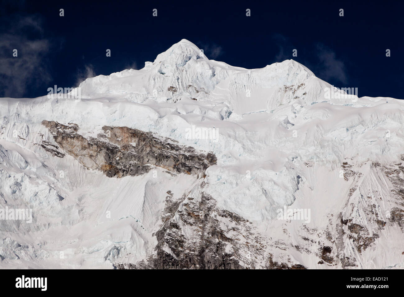 The snow-covered mountain Nevado Chopicalqui, Cordillera Blanca, Peru Stock Photo
